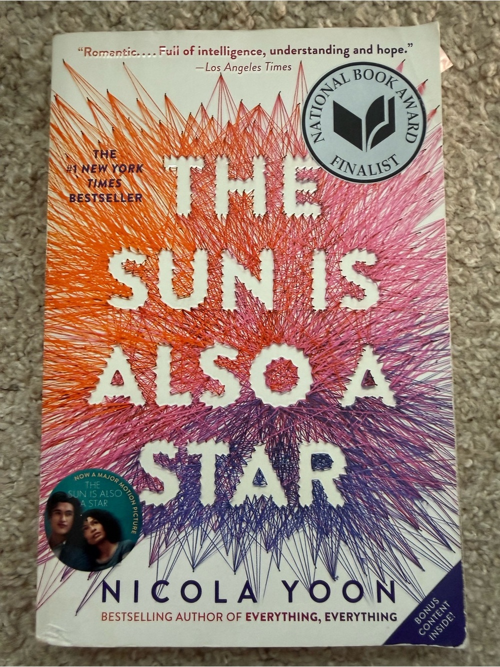 The Sun Is Also a Star by Nicola Yoon — Vibrant Orange, Pink & Purple Cover